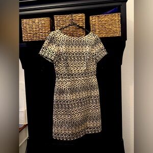 Gold and black classy cocktail dress.